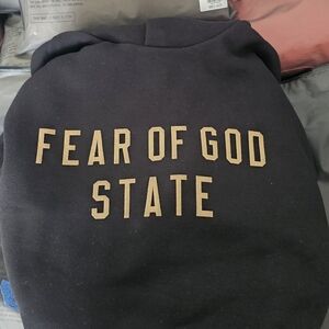 Fear of God Black Hoodie with Gold Text